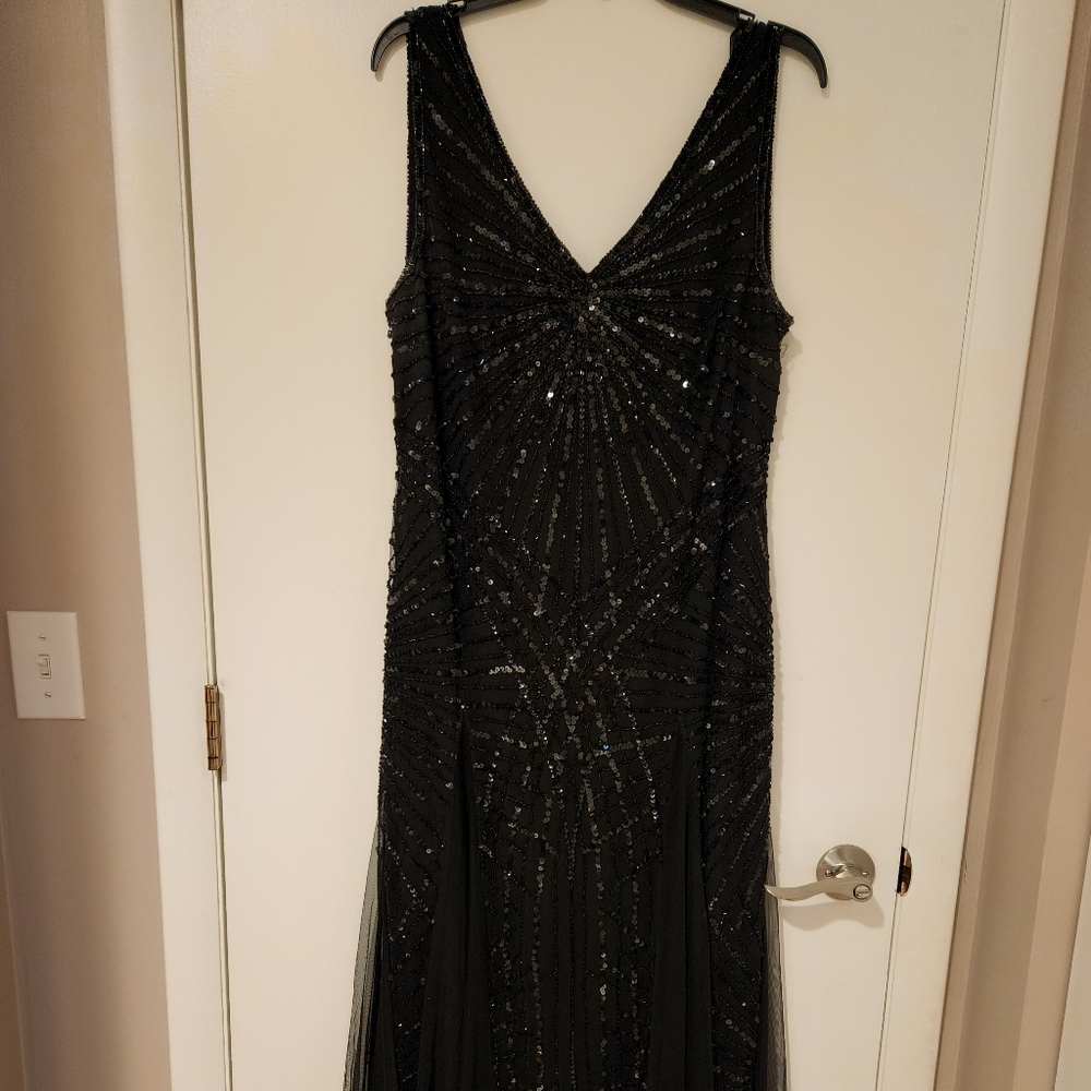 Elegant long woman's black sleeveless, V-neck sequined, gown, Size 16